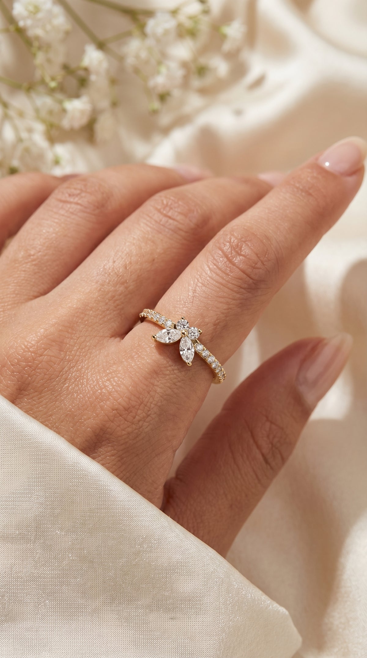 Elegant Floral Marquise and Round Diamond Ring