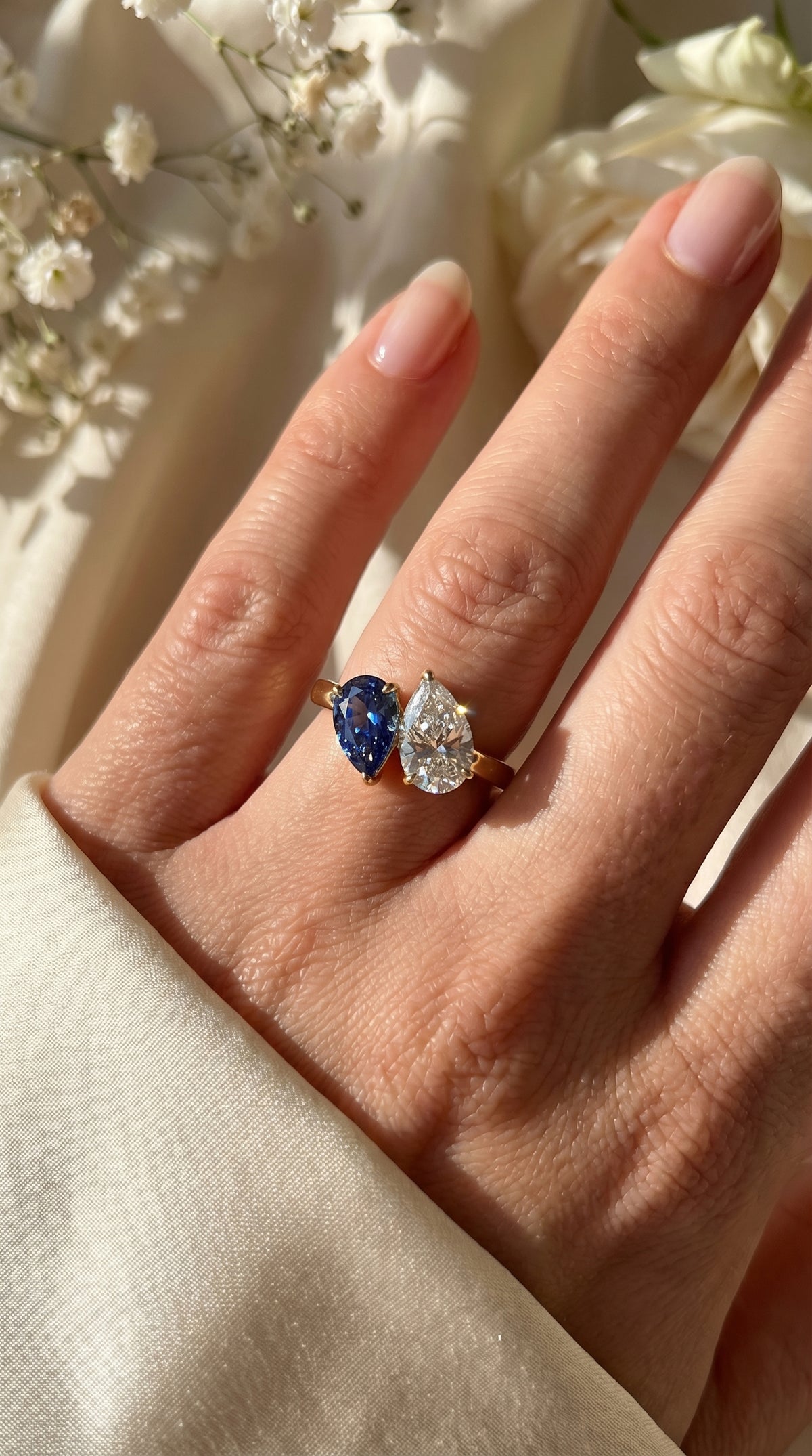 Luxury Toi et Moi Ring with Blue Sapphire and Pear Shape Diamond