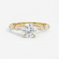 Elegant Round Prong Set Diamond Ring with Marquise Accents Side Stone Engagement Ring