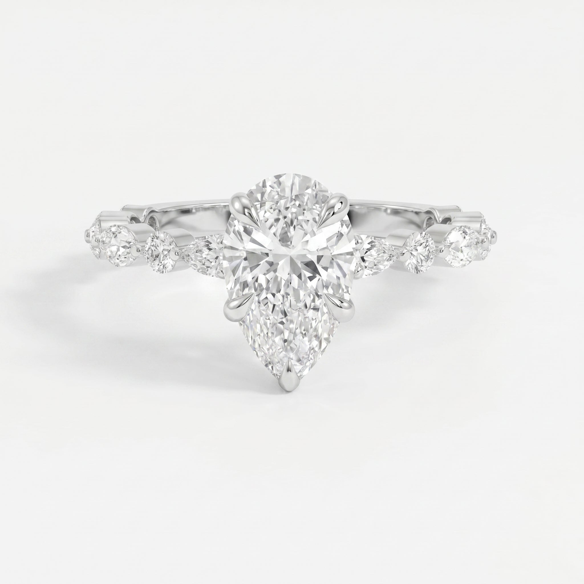 Elegant Pear Cut Diamond Side Stones  Engagement Ring