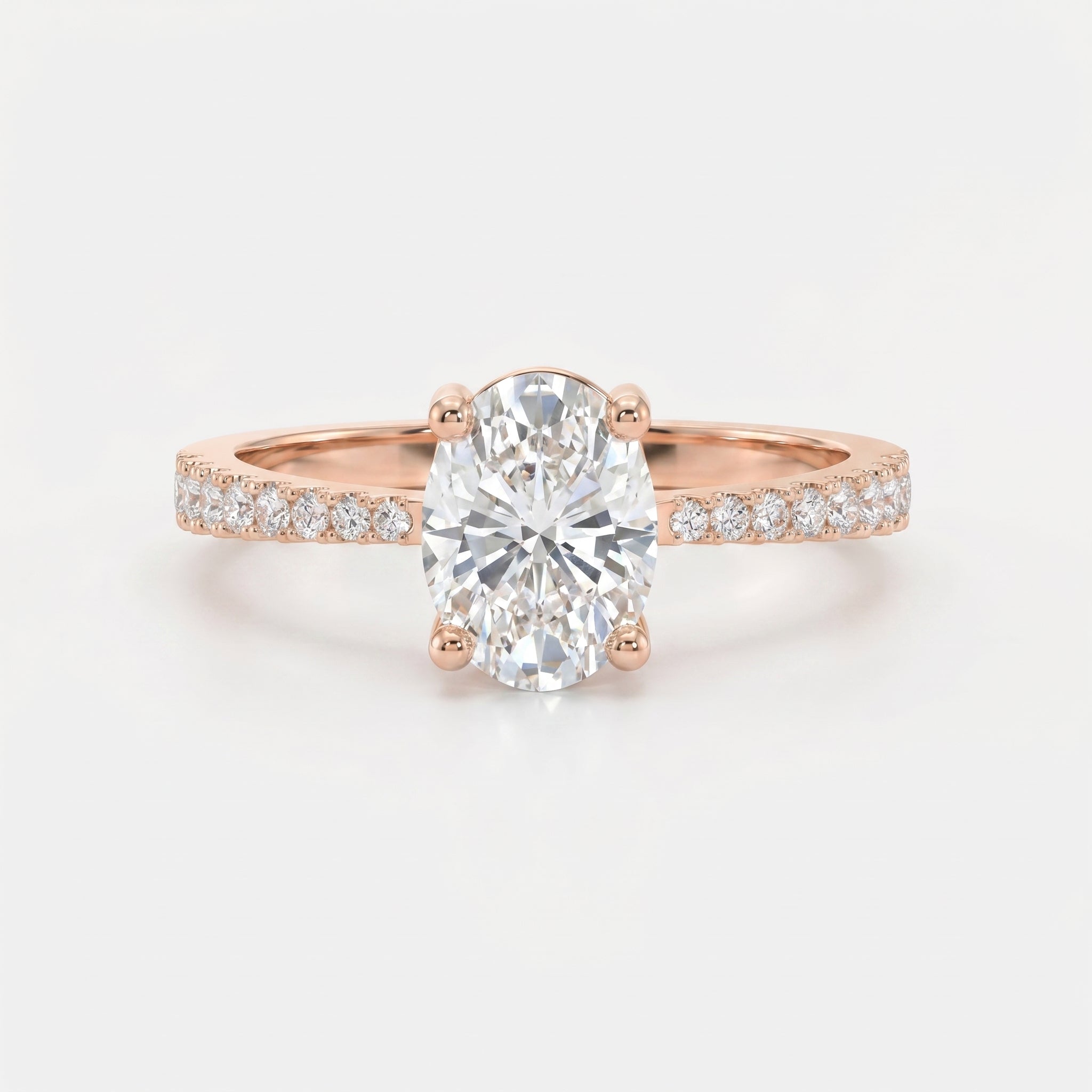 Oval Cut Diamond Side Stone Engagement Ring with Pavé Band