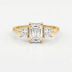 The Axis Trio Emerald Ring