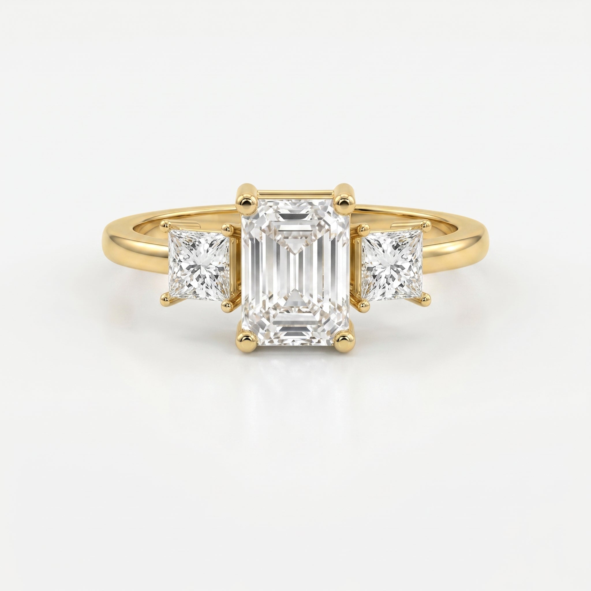 The Axis Trio Emerald Ring