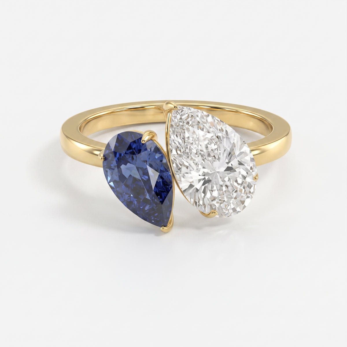 Luxury Toi et Moi Ring with Blue Sapphire and Pear Shape Diamond