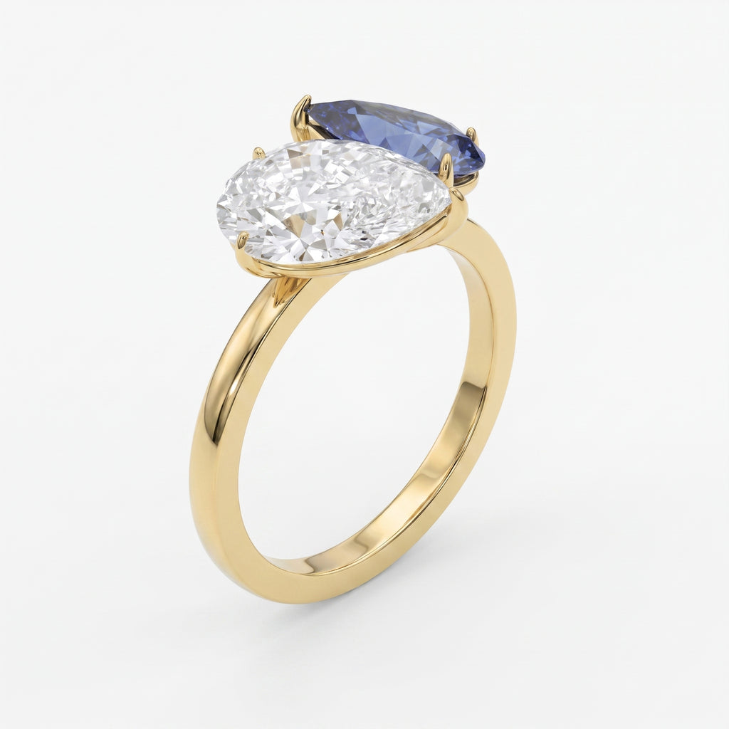 Luxury Toi et Moi Ring with Blue Sapphire and Pear Shape Diamond