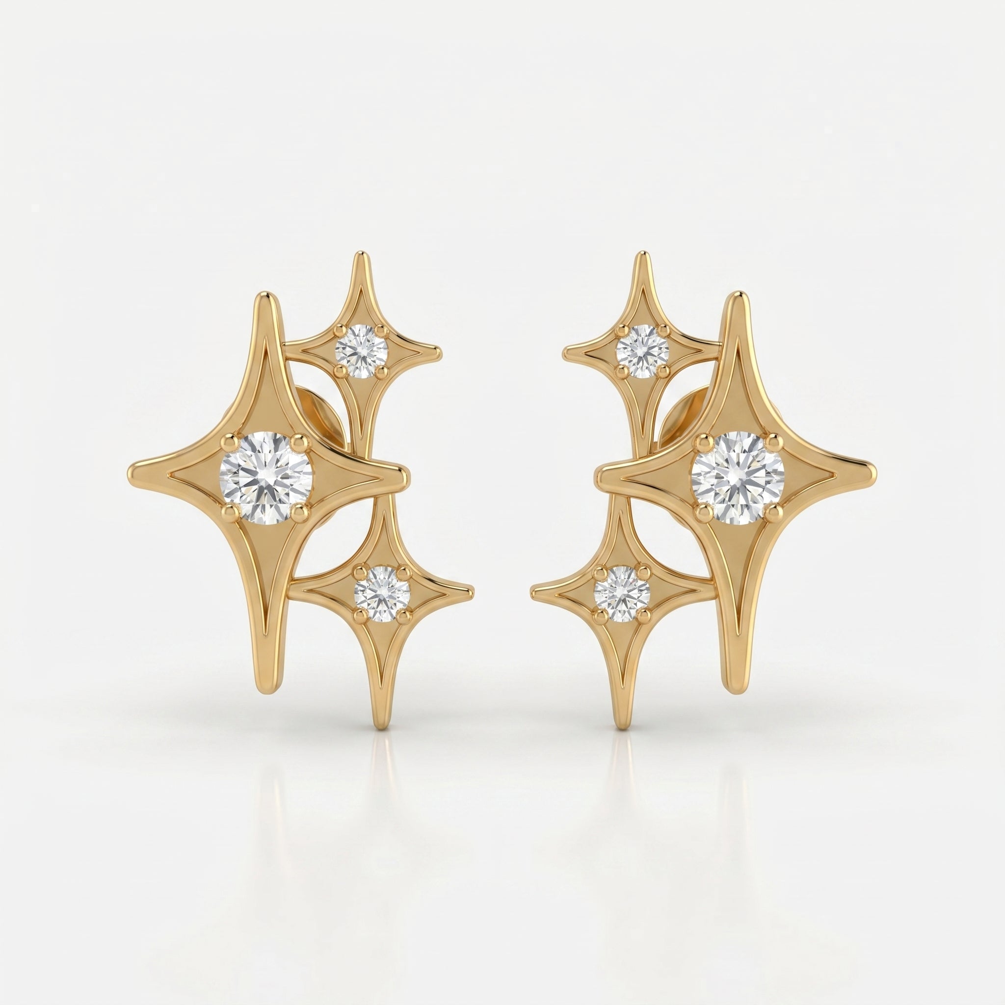Luxury gold celestial star stud earrings with brilliant round stones on white background, minimalist fine jewelry design