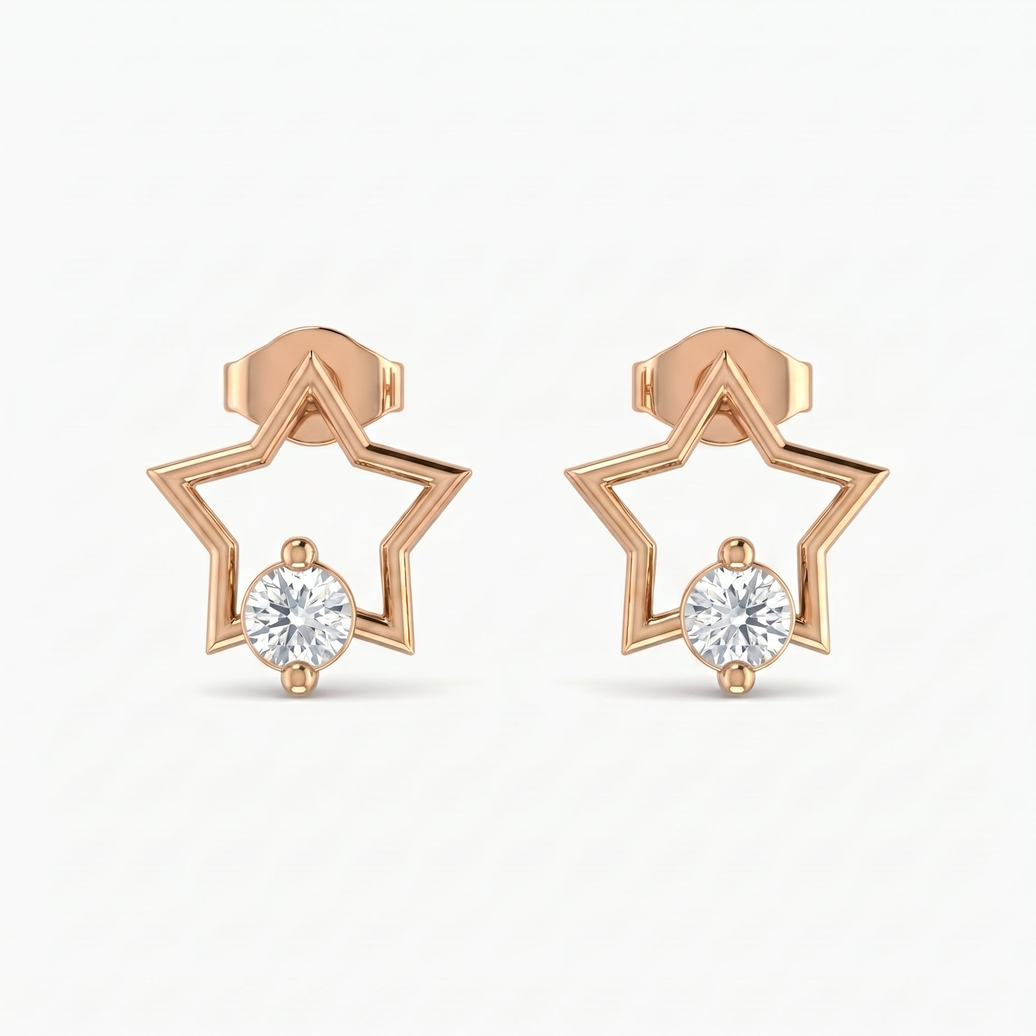 Rose gold star stud earrings with round crystal accent on white background minimalist celestial jewelry design