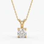 Gold necklace with a diamond pendant on a white background
