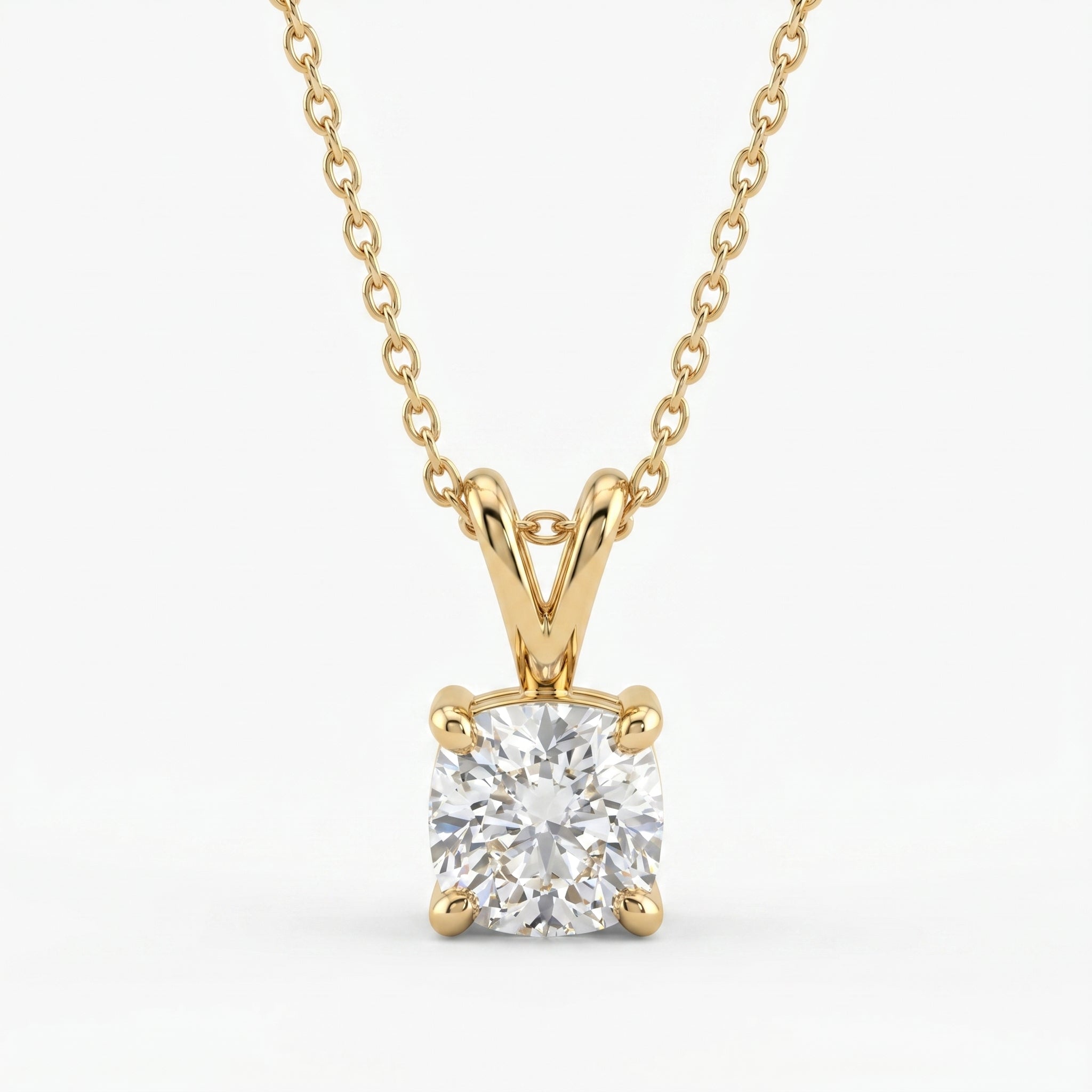 Gold necklace with a diamond pendant on a white background