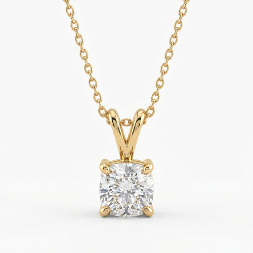 Gold necklace with a diamond pendant on a white background