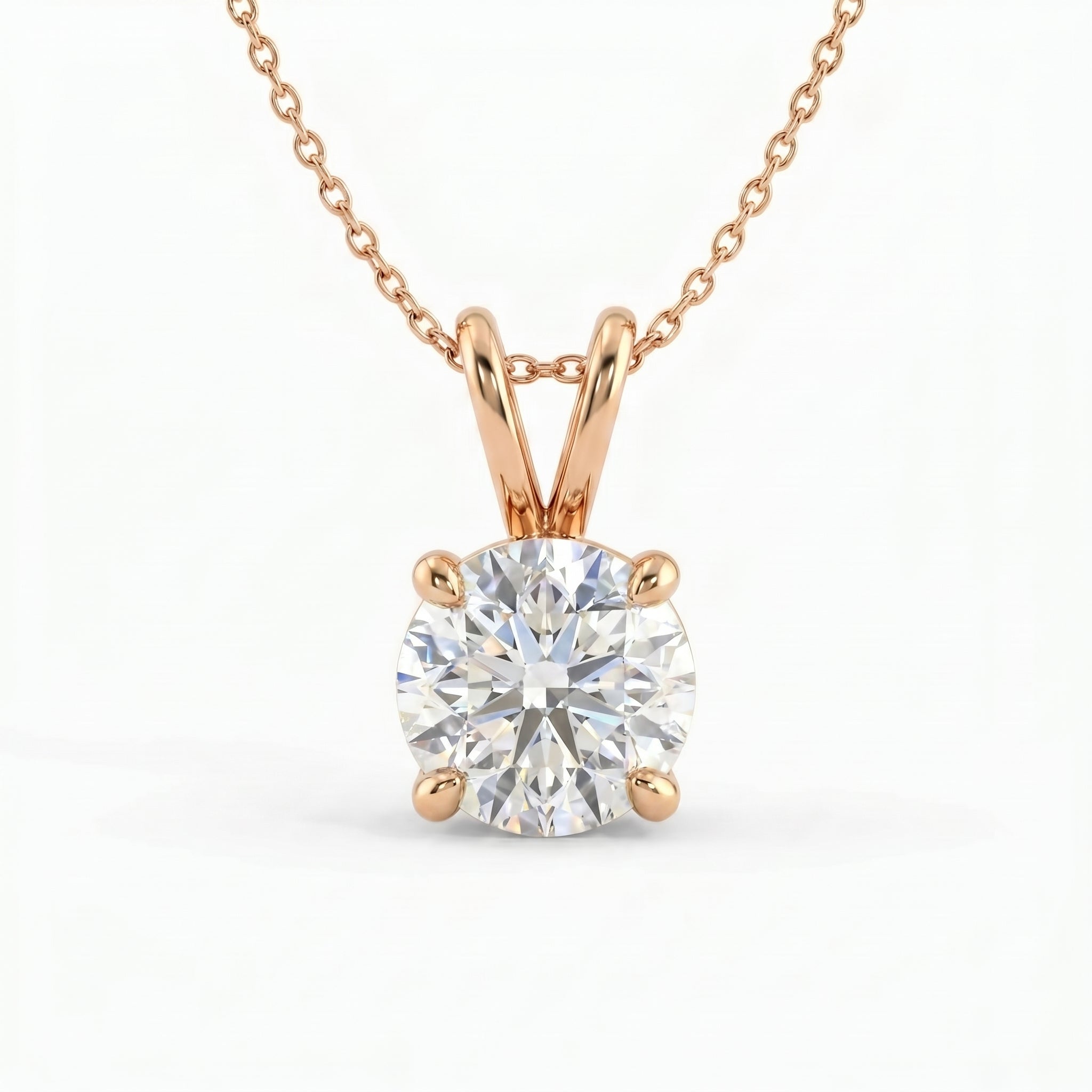Rose gold necklace with a round diamond pendant on a white background