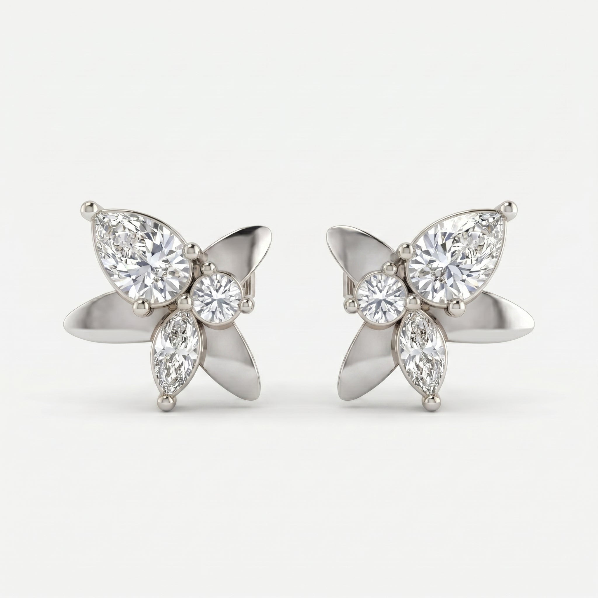 Side profile of luxury butterfly diamond earrings showing secure gold setting and stud backing detail