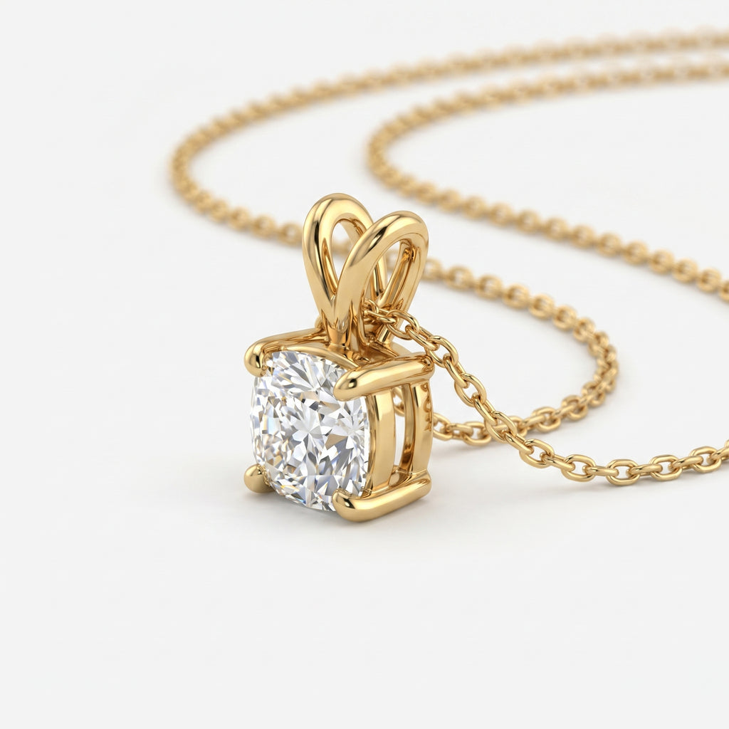 Gold necklace with a diamond pendant on a white background