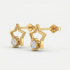 Minimalist gold star earrings with sparkling round gemstone in premium angled studio product photo