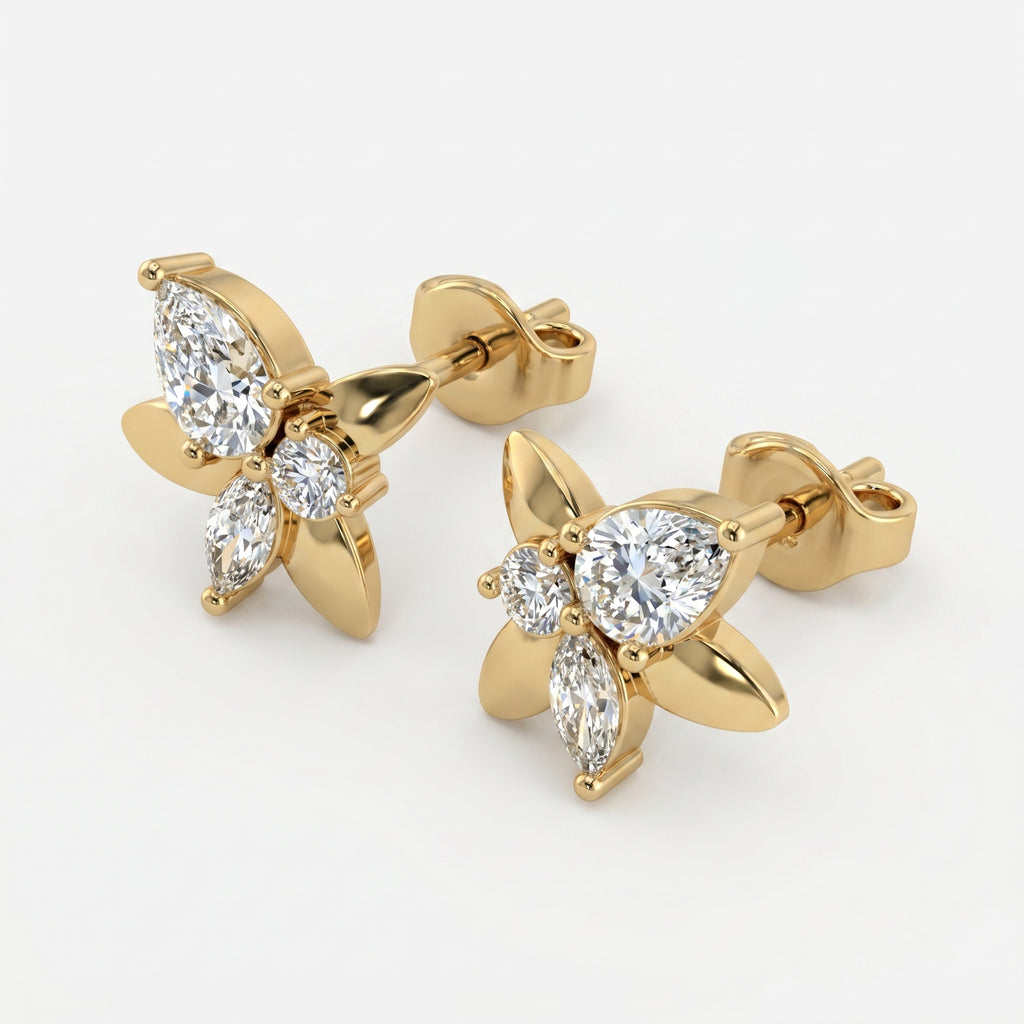 Luxury butterfly diamond earrings in yellow gold shown at elegant angled perspective