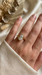 Modern Twist Bypass Design Oval Diamond Solitaire Ring