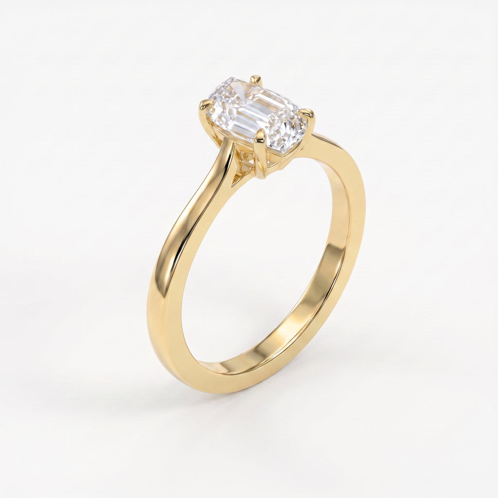 Flame cut diamond solitaire engagement ring in polished yellow gold with four prong setting shown at 45 degree angle.