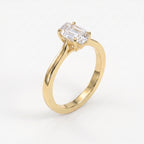 Flame cut diamond solitaire engagement ring in polished yellow gold with four prong setting shown at 45 degree angle.