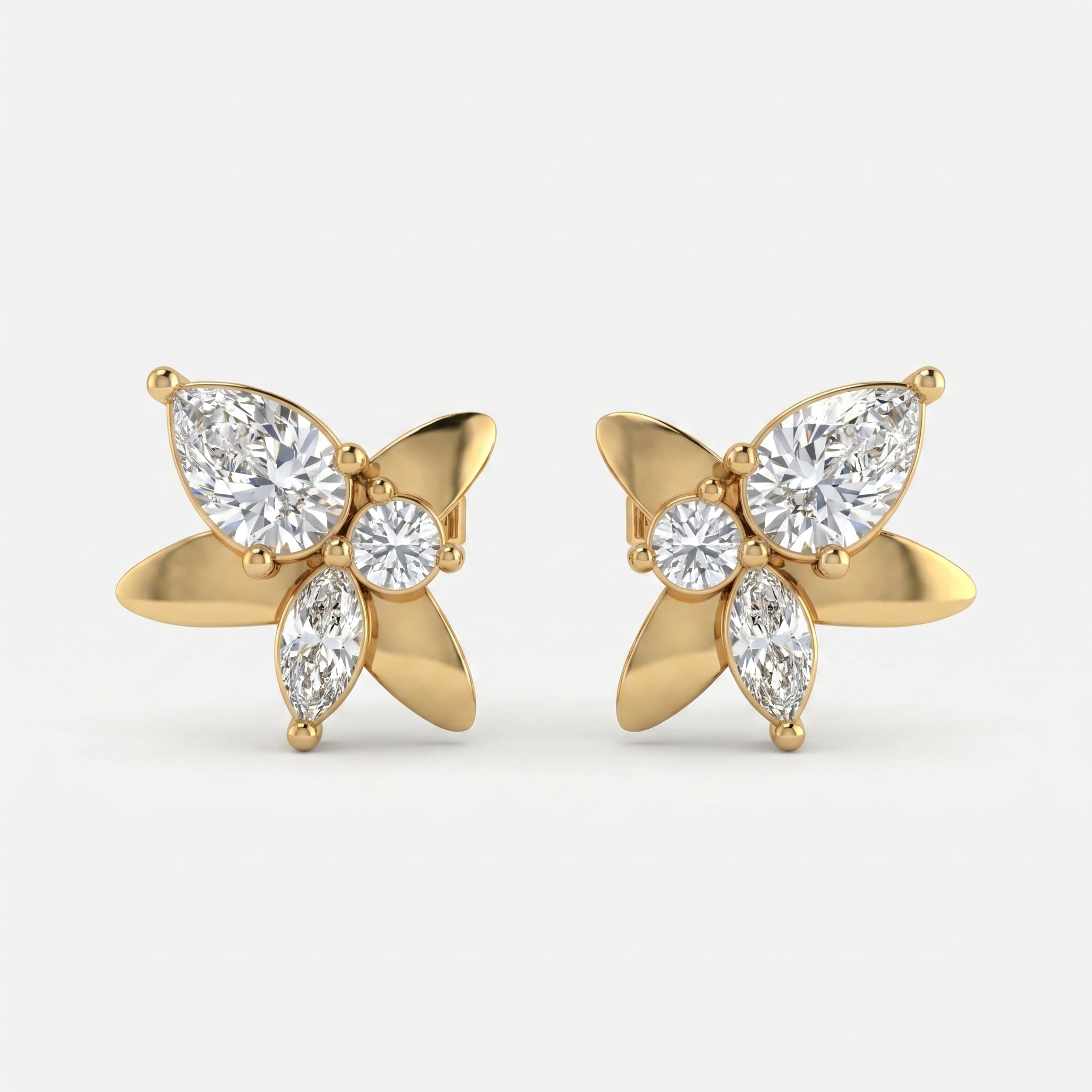 Butterfly diamond stud earrings in yellow gold with pear, marquise and round lab-grown diamonds