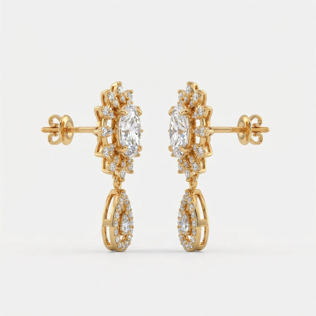 45-degree view of yellow gold diamond drop earrings featuring oval center stones and pavé halo detailing