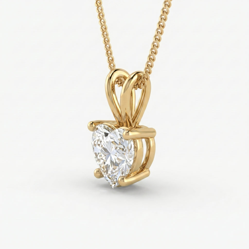 Gold necklace with a pear-shaped diamond pendant on a white background