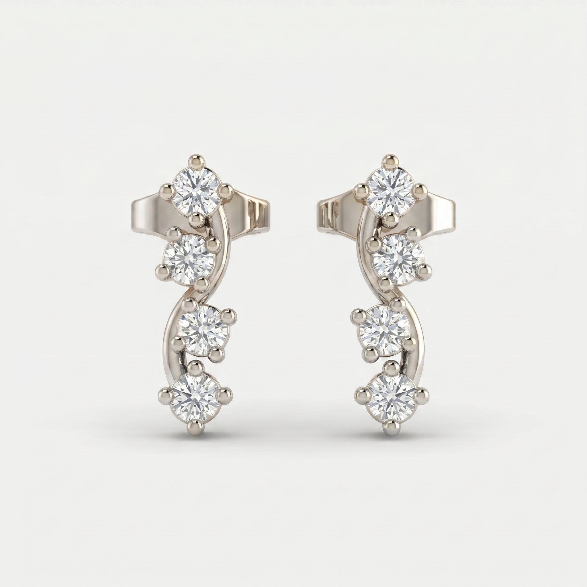 Angled view of White gold ear climber earrings featuring round brilliant stones and elegant curved design