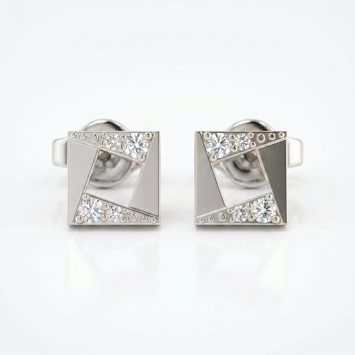White gold square stud earrings with diamond accents shown at 45-degree angle on white background