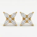 Luxury butterfly stud earrings with marquise diamonds and gold prong setting at elegant 45-degree angle