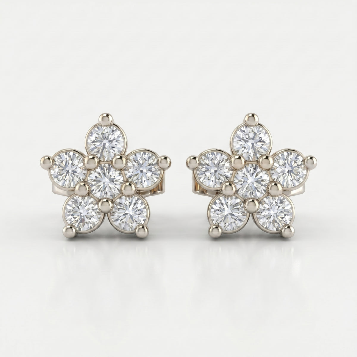 Side profile of floral diamond stud earrings showing White gold setting craftsmanship and structure