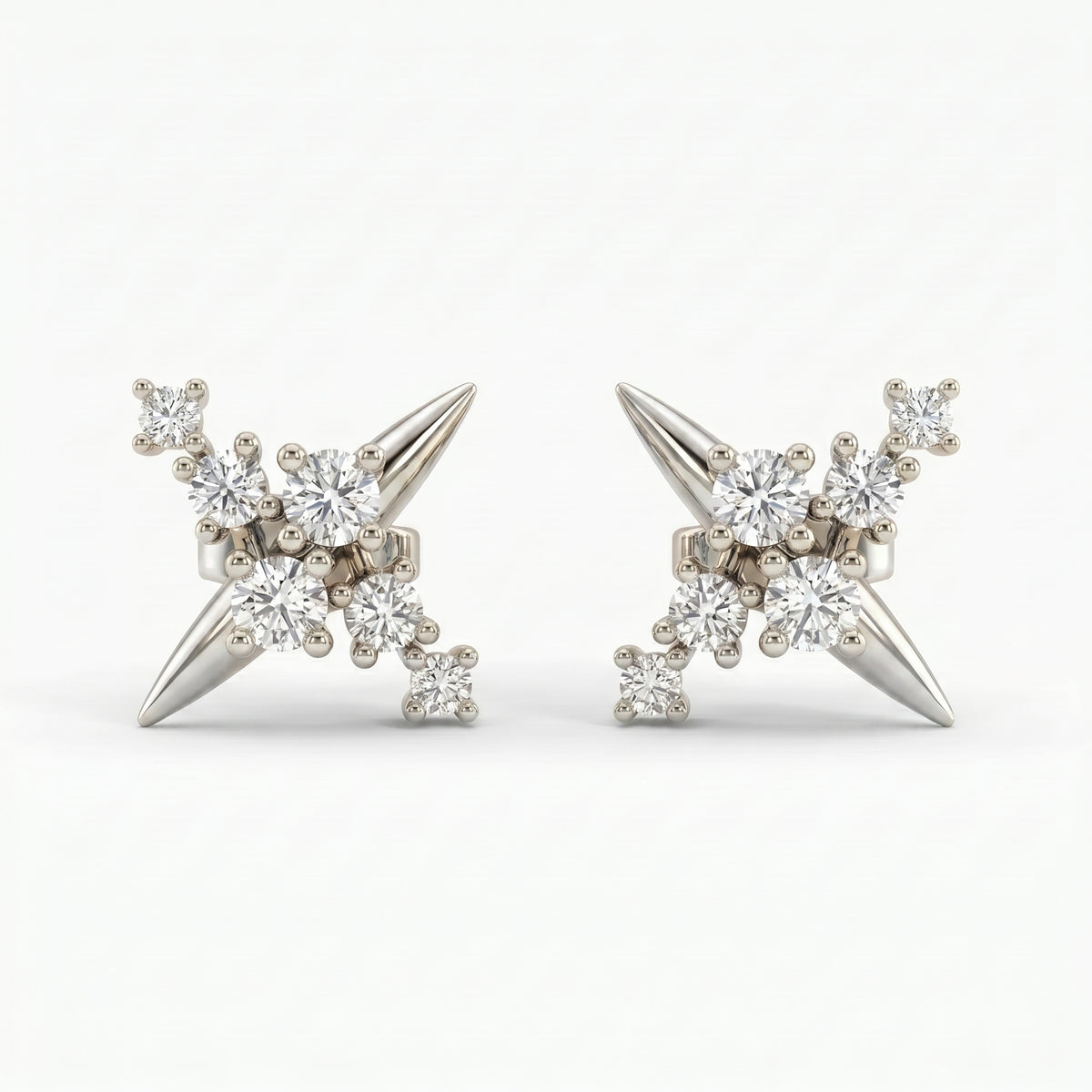 Luxury diamond cluster spike stud earrings in White gold shown at 45-degree angle with brilliant sparkle detail