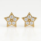 Macro close-up of pavé diamond star earrings showing sparkling stones and intricate gold bead detailing