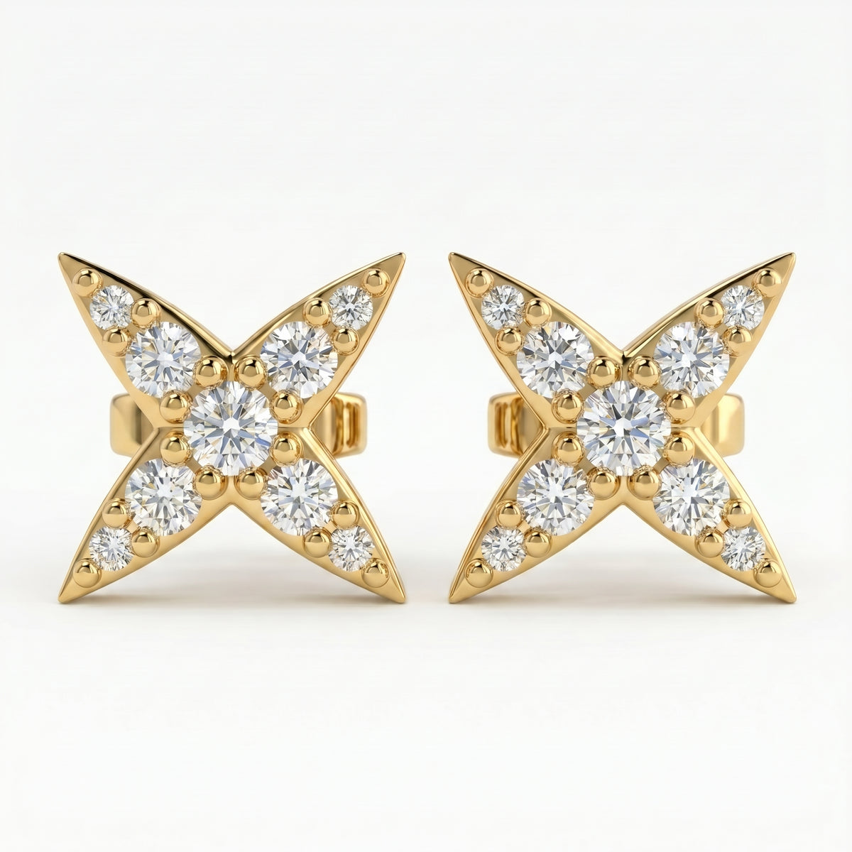 Side profile of diamond star stud earrings featuring secure post backing and polished fine jewelry finish