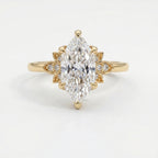 dutch-Marquise diamond engagement ring in yellow gold with floral side accents and pavé diamonds, luxury bridal jewelry