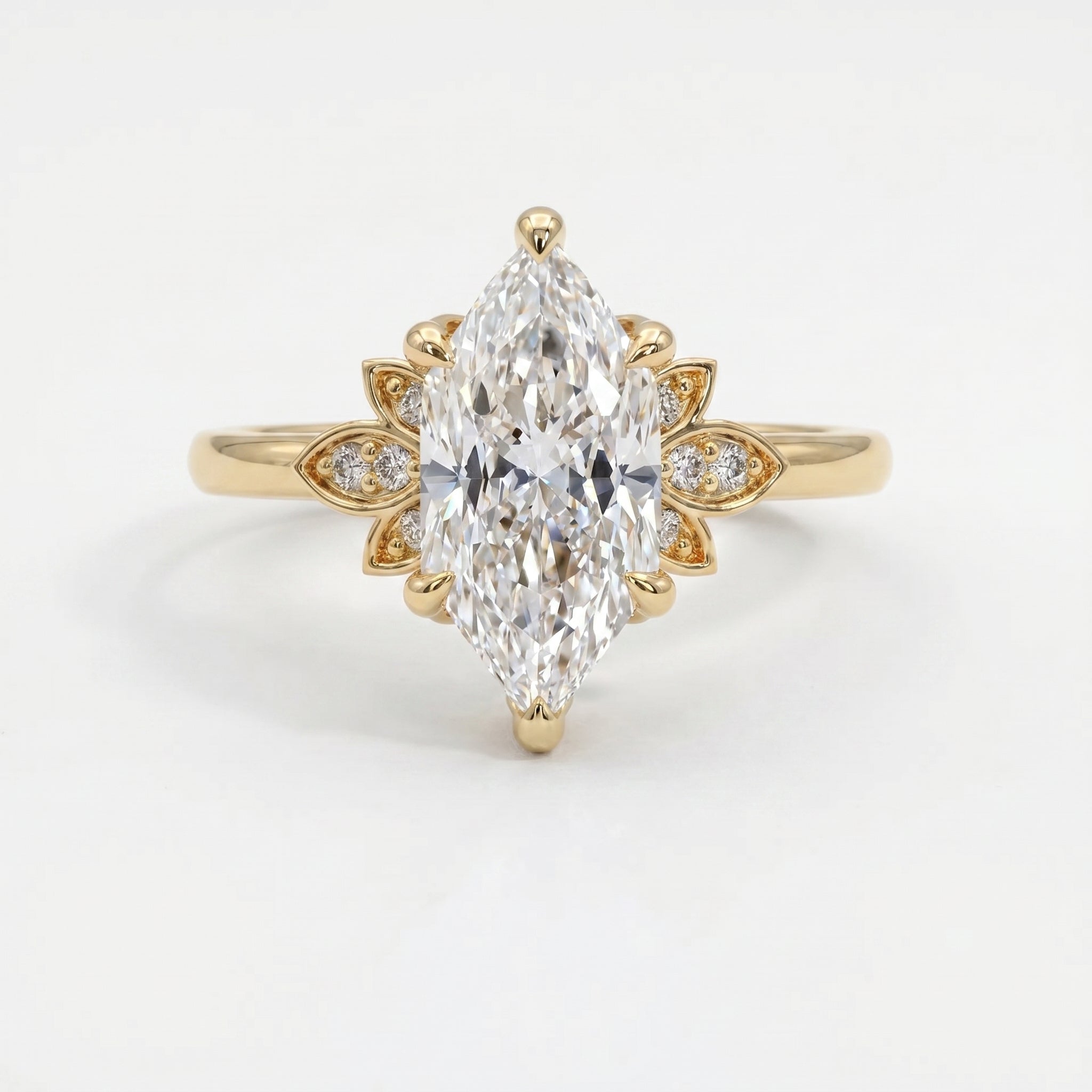 dutch-Marquise diamond engagement ring in yellow gold with floral side accents and pavé diamonds, luxury bridal jewelry