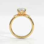 Side profile of dutch marquise diamond engagement ring with elevated floral gallery and polished yellow gold band