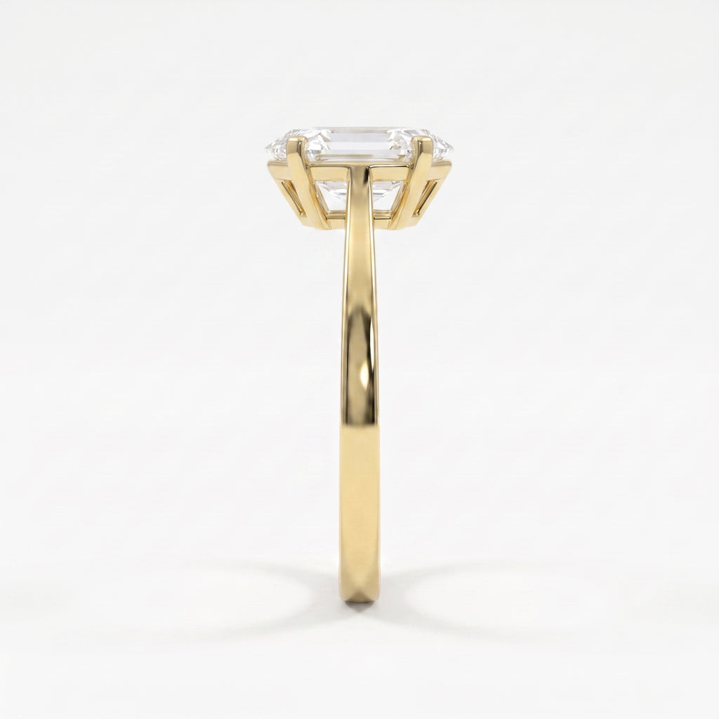 Side profile of an elongated hexagon diamond solitaire engagement ring highlighting the elegant four-prong cathedral setting.