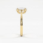 Side profile of an elongated hexagon diamond solitaire engagement ring highlighting the elegant four-prong cathedral setting.