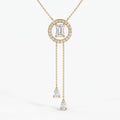 Emerald-cut halo lariat necklace in yellow gold with two pear-shaped diamond drop chains