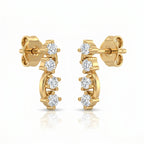 45-degree view of curved yellow gold diamond stud earrings with graduated round stones