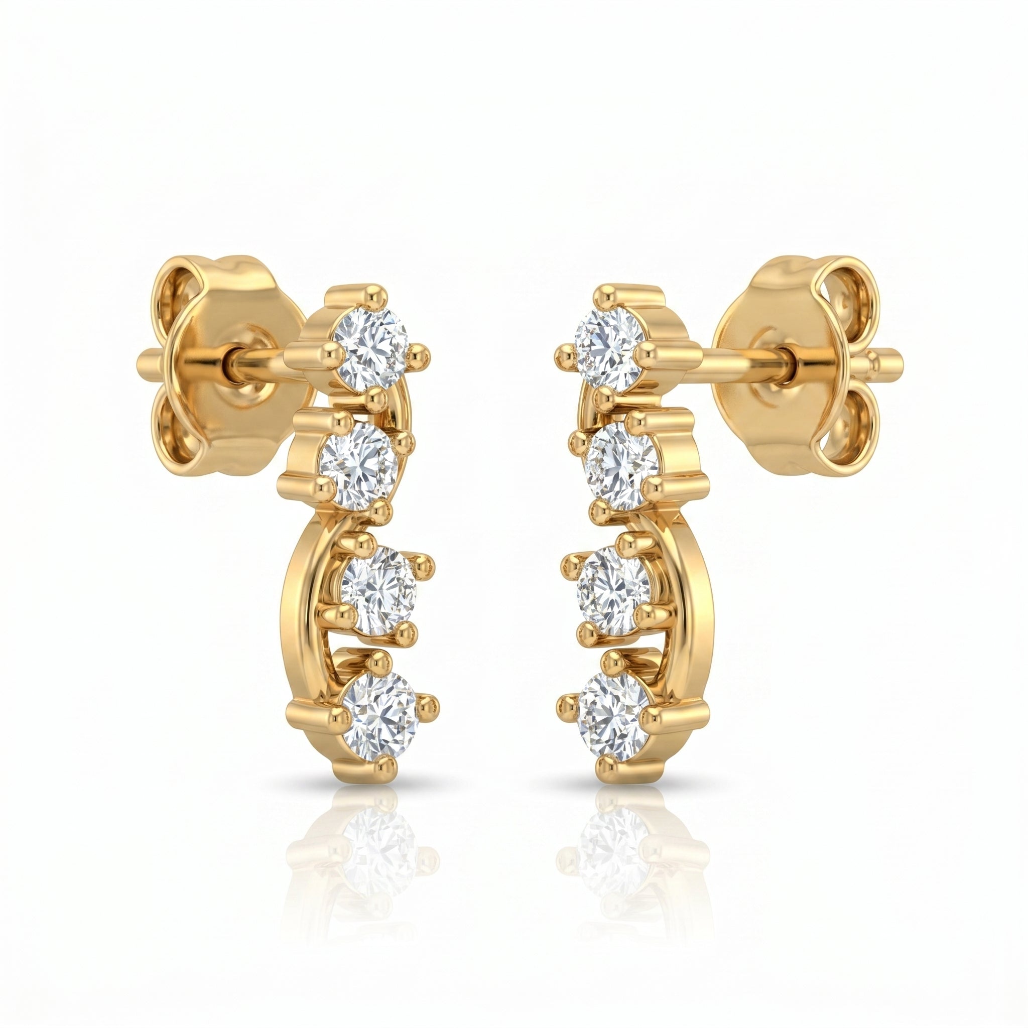 45-degree view of curved yellow gold diamond stud earrings with graduated round stones