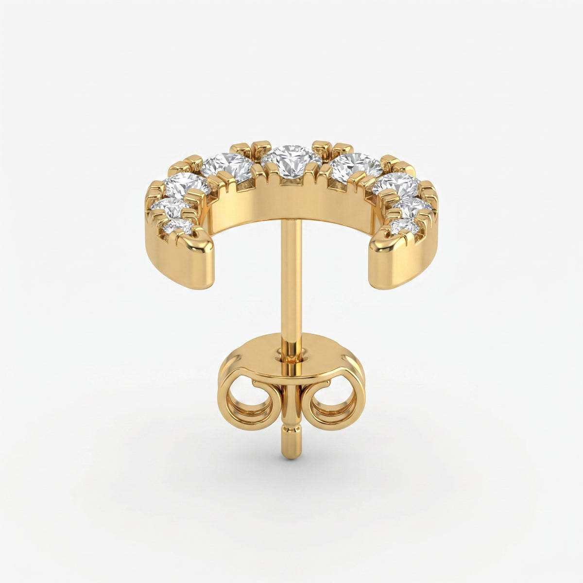Luxury yellow gold crescent earrings with brilliant pavé diamonds in angled studio product shot