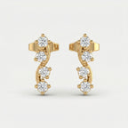 Luxury yellow gold curved stud earrings with four round brilliant stones on a clean white background