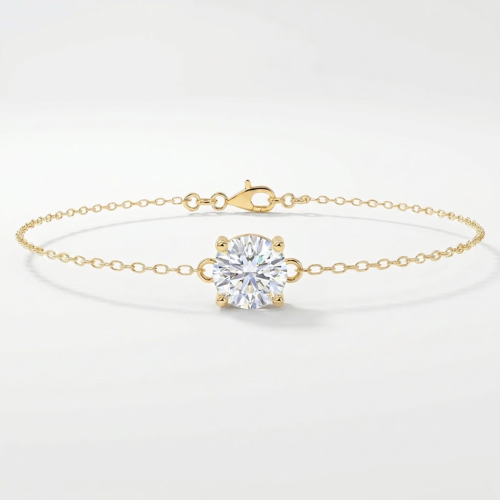 Minimalist yellow gold solitaire chain bracelet with round brilliant stone on clean white background
