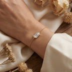 Close-up detail of hexagon cut diamond bracelet showing bezel craftsmanship and sparkling gemstone facets