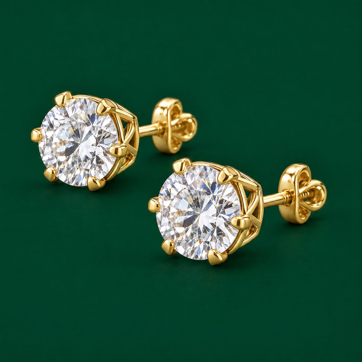Diamond stud earrings in 18K yellow gold, three-quarter angle