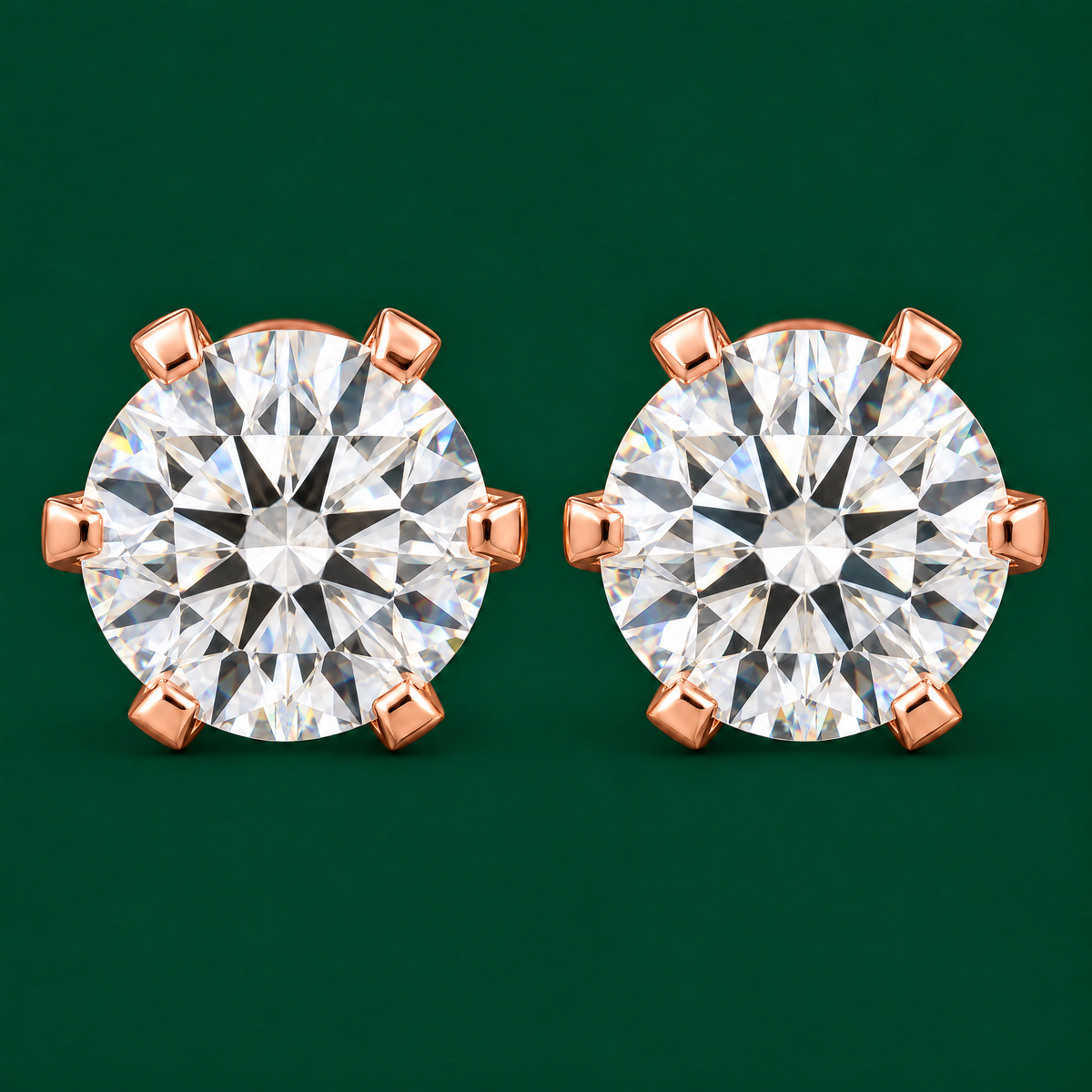Diamond stud earrings in 18K rose gold, front view