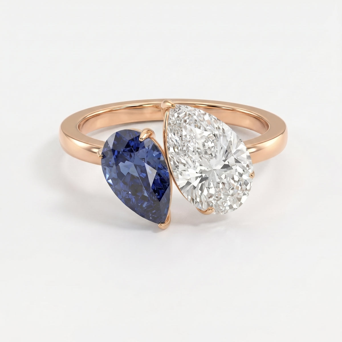 Luxury Toi et Moi Ring with Blue Sapphire and Pear Shape Diamond