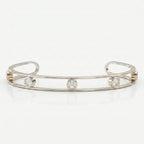 Minimalist Cuff Bracelet with Bezel Set Round Diamond