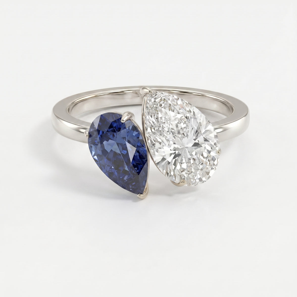 Luxury Toi et Moi Ring with Blue Sapphire and Pear Shape Diamond