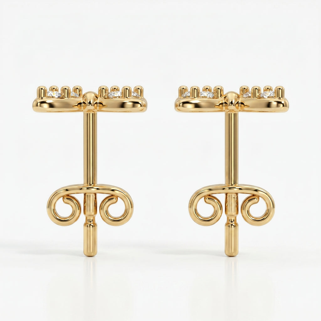 Macro close-up of pavé diamonds on butterfly stud earrings with high-polish luxury gold finish